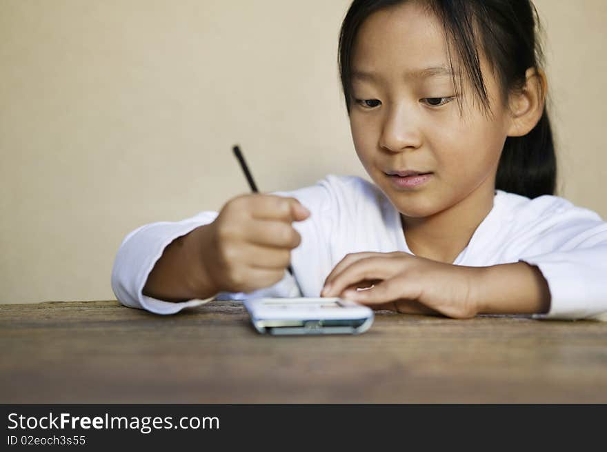 Asian ethnic Girl using PDA