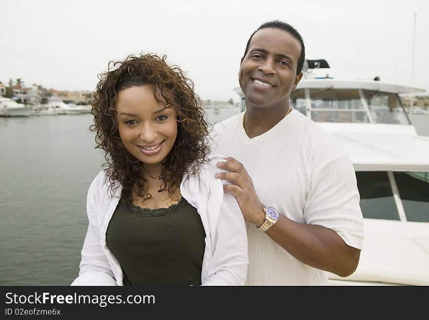 Middle aged Couple on yacht, (portrait)