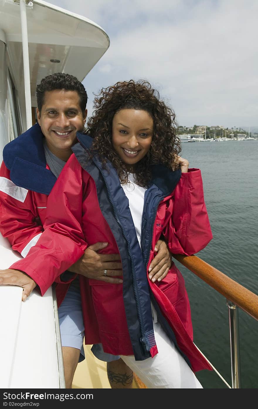 Middle aged Couple on yacht, (portrait)