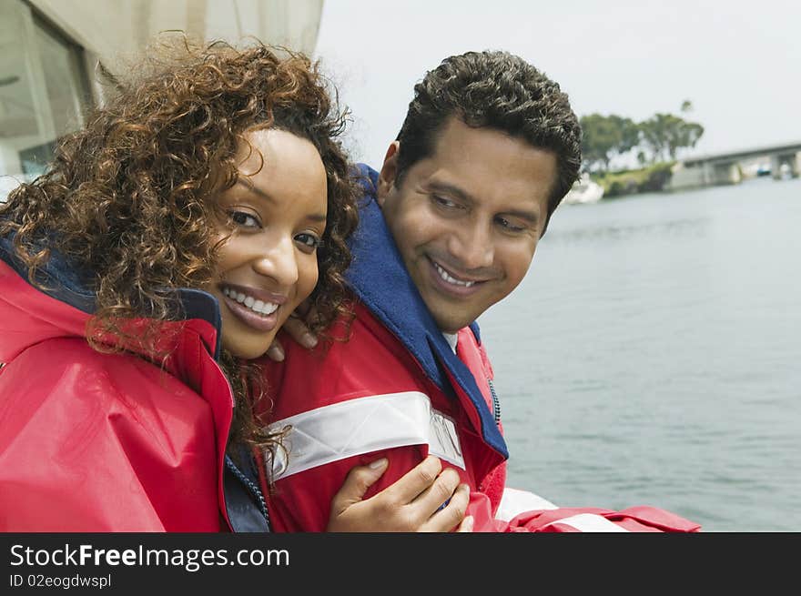 Middle aged Couple on yacht, (portrait)