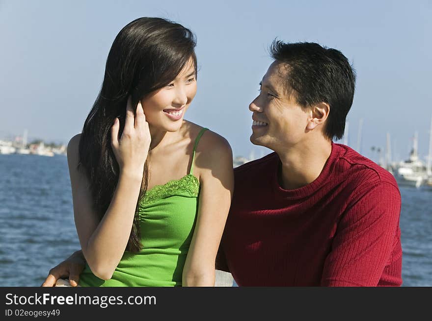 Couple relaxing on boat