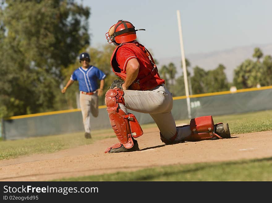 Runner Approaching To Catcher