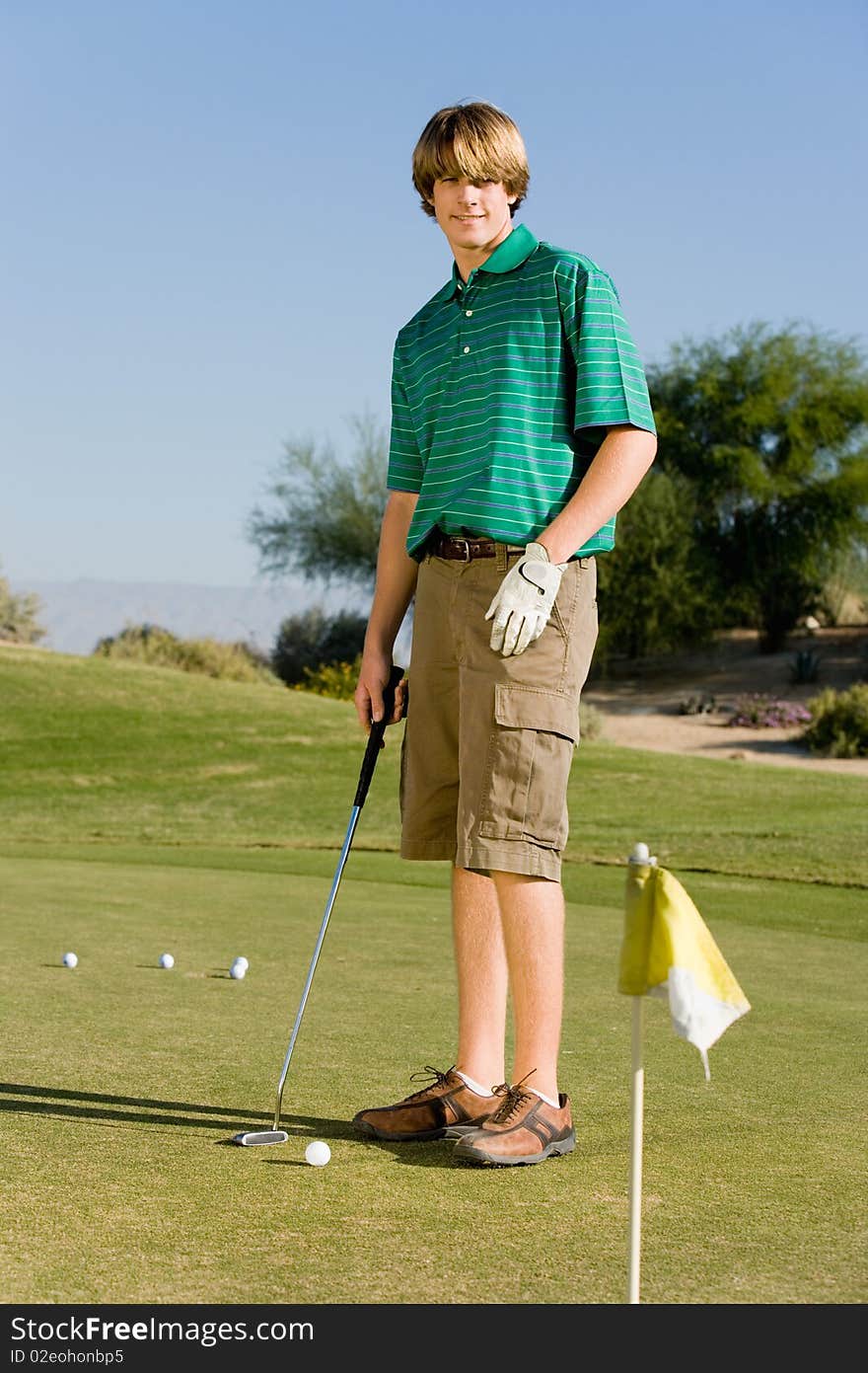 Golfer practising