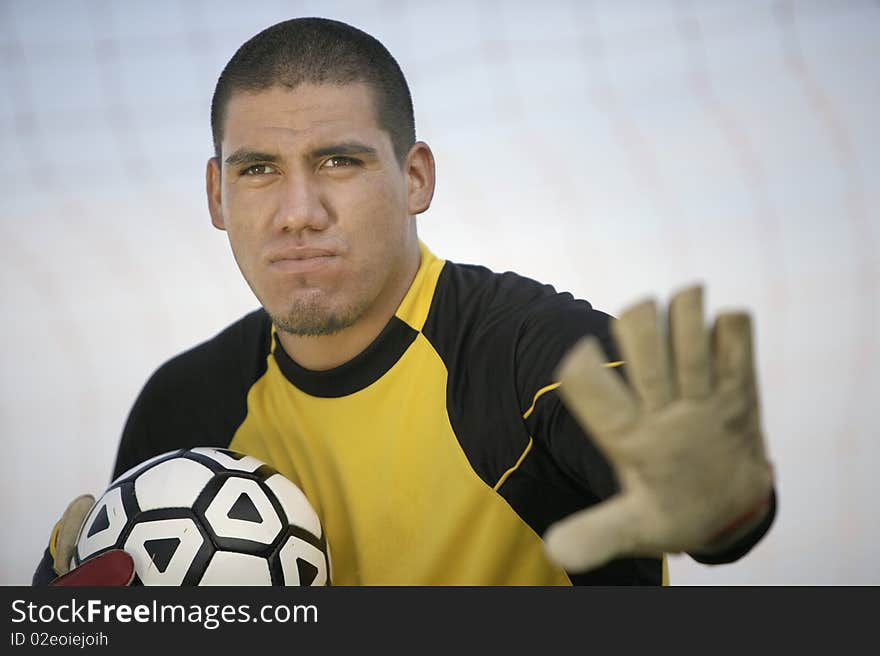 Goalkeeper holding ball