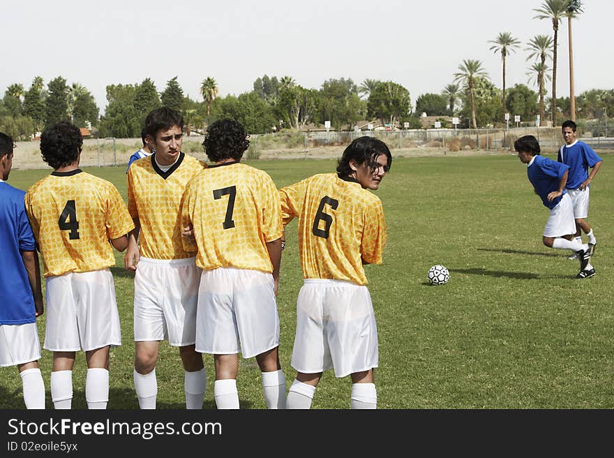 Soccer Players Preparing for a Free Kick