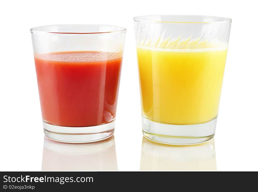 Tomato and orange juice isolated on white background