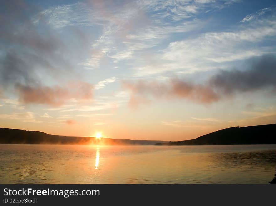 An image of a beautiful sunset over the river