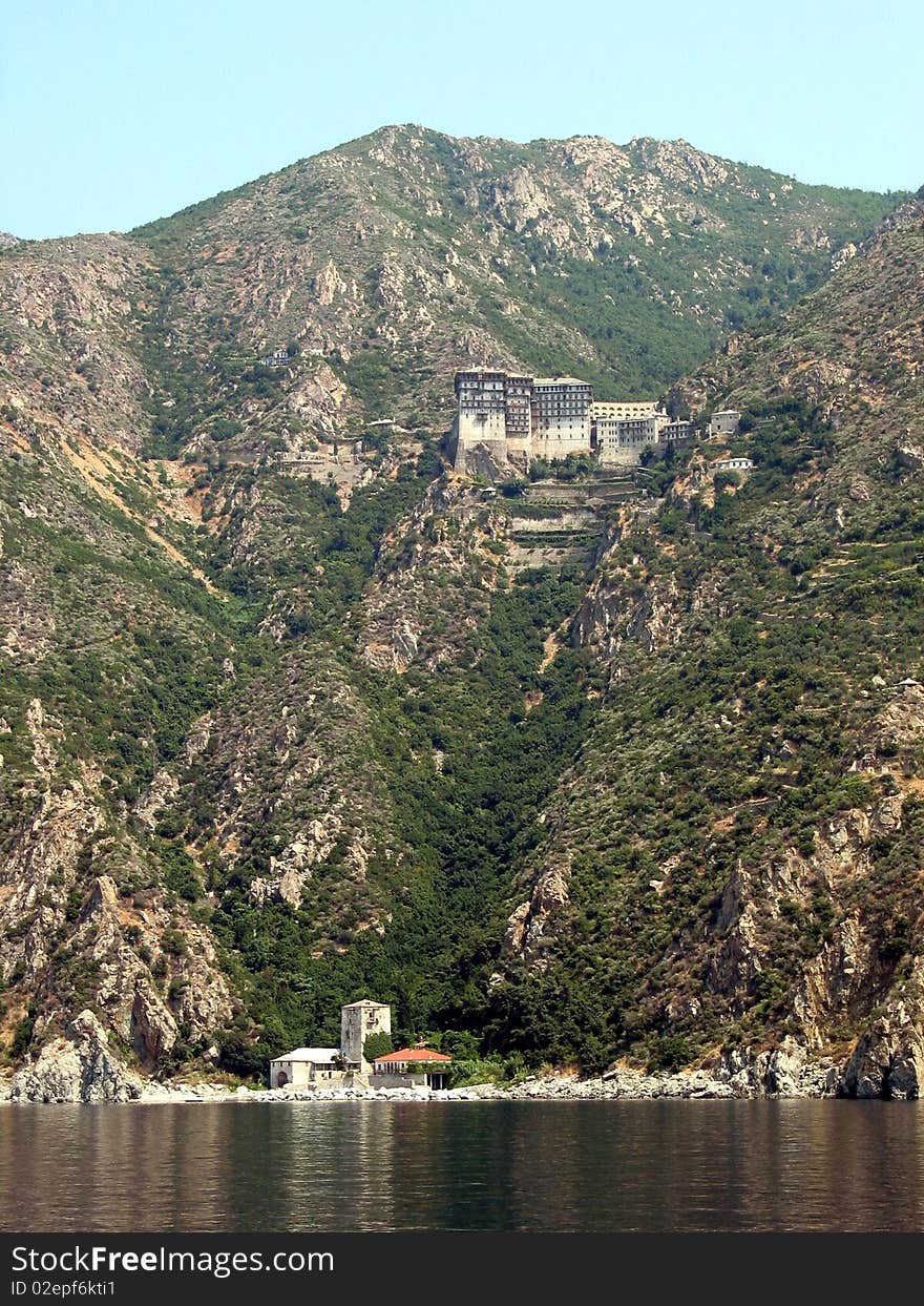 Monastery at holly Mt Athos seen from a cruise ship. Monastery at holly Mt Athos seen from a cruise ship