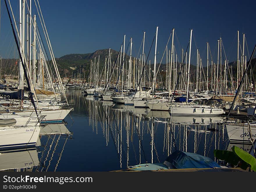 Yachts stand on a mooring