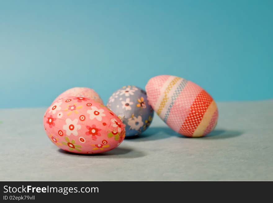 Decorated easter eggs on blue background