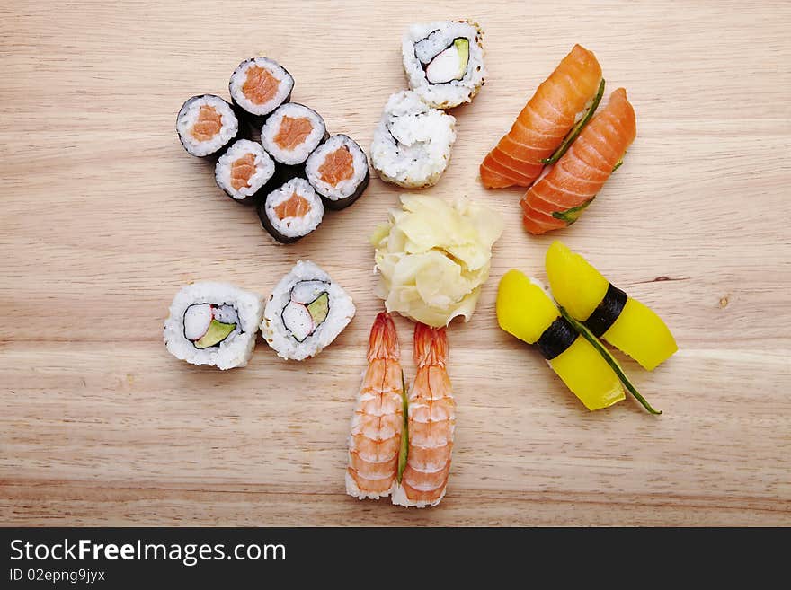 Tasteful Japanese sushi over bamboo background.