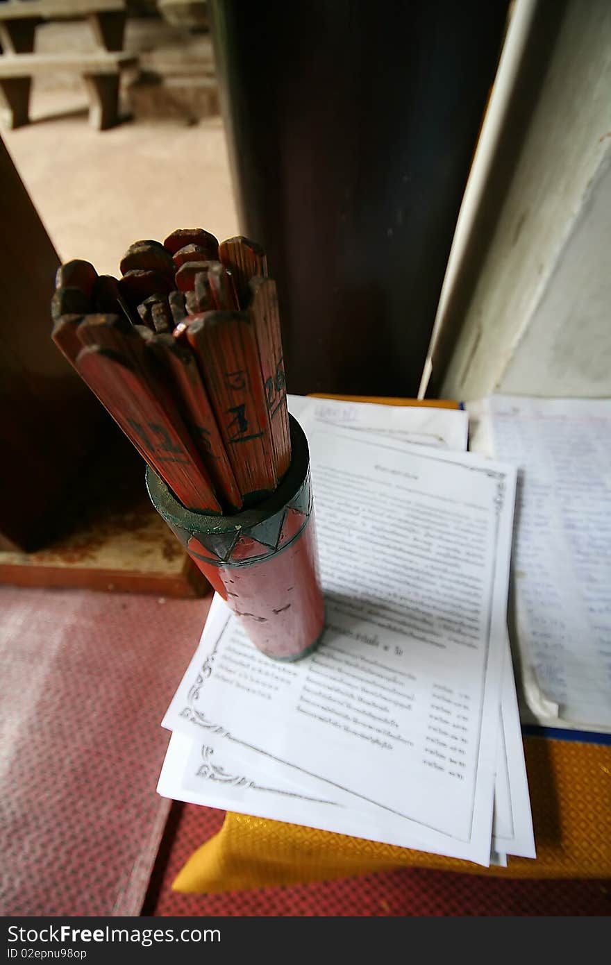 Chinese fortune teller with result paper in Thai temple. Chinese fortune teller with result paper in Thai temple