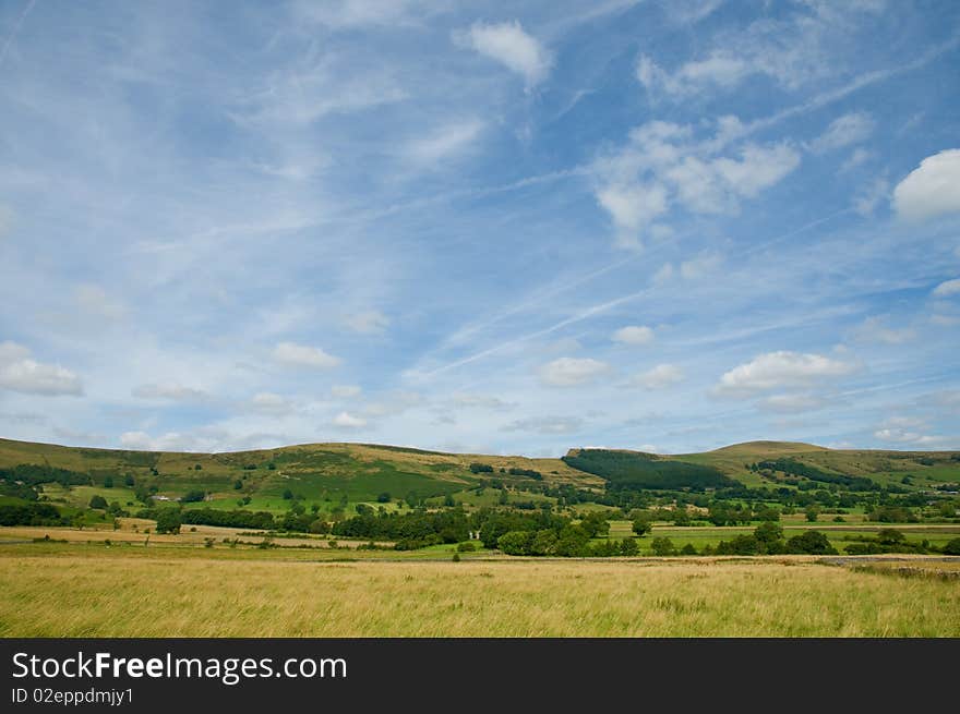 A view at castleton 
in derbyshire in the united kingdom. A view at castleton 
in derbyshire in the united kingdom