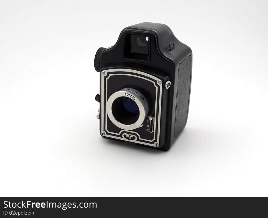 Old camera isolated in frot of the white background