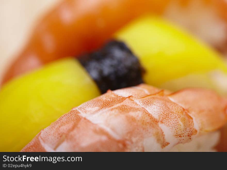 Tasteful Japanese sushi over bamboo background.