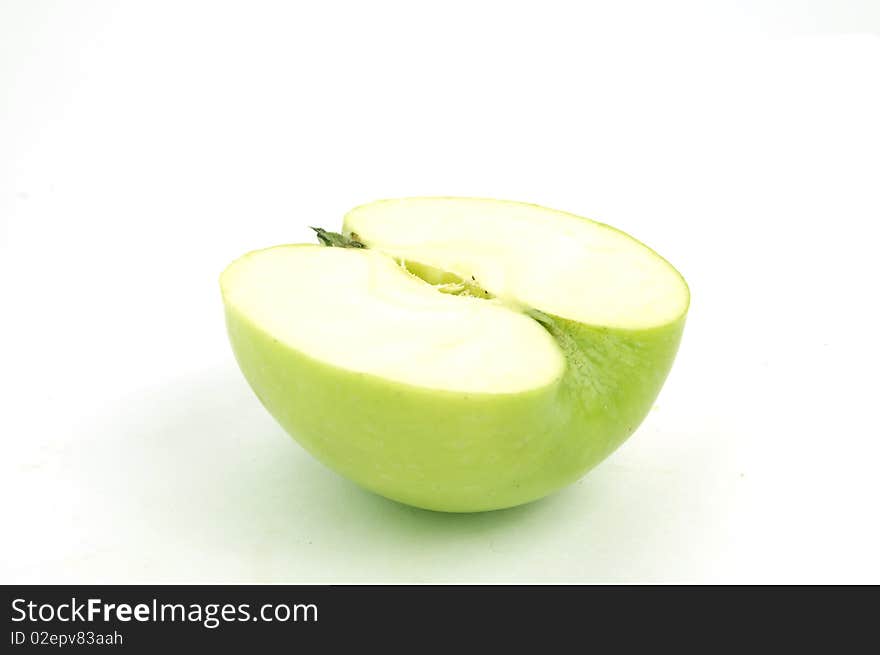 Green apple on the white background, isolated