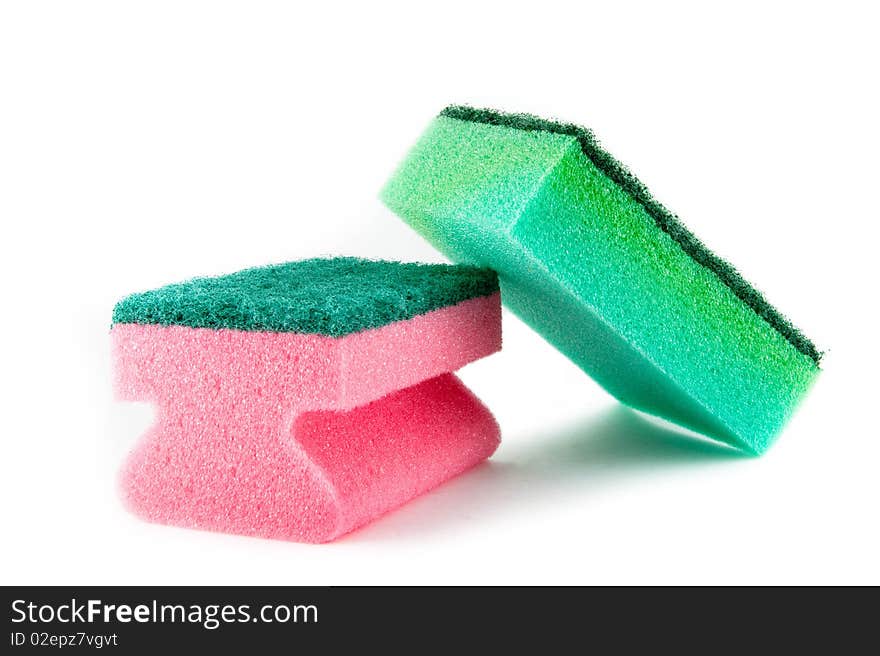 Natural sponge in front of a bright white background. Natural sponge in front of a bright white background.