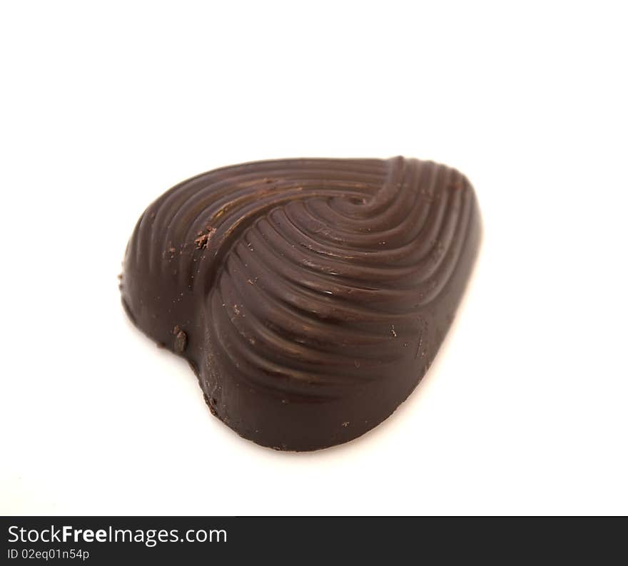 A chocolate heart isolated on a white background