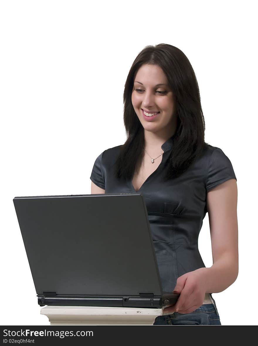 Cheerful young lady with a laptop isolated on a white