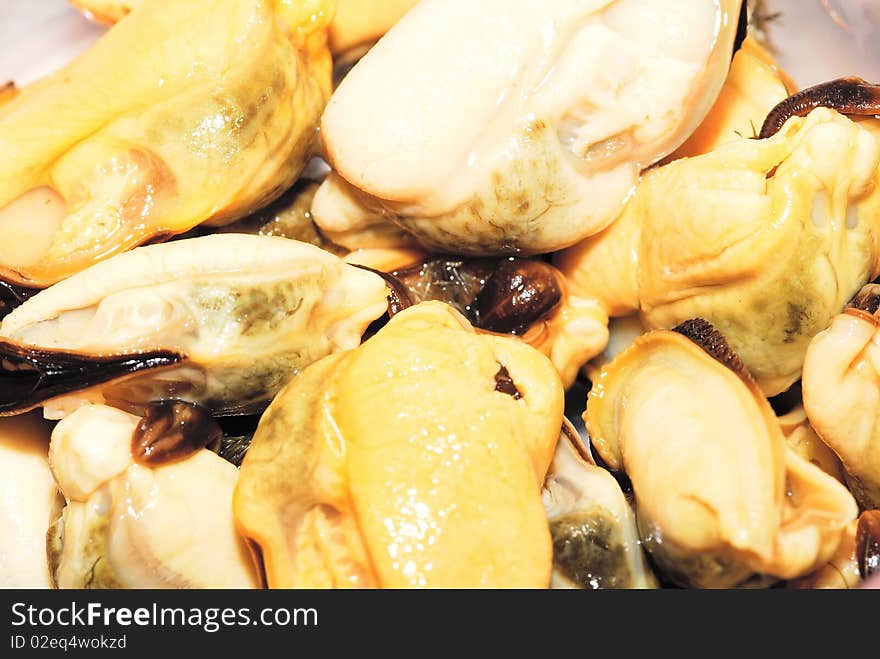 Pile of boiled mussels on a plate. Pile of boiled mussels on a plate