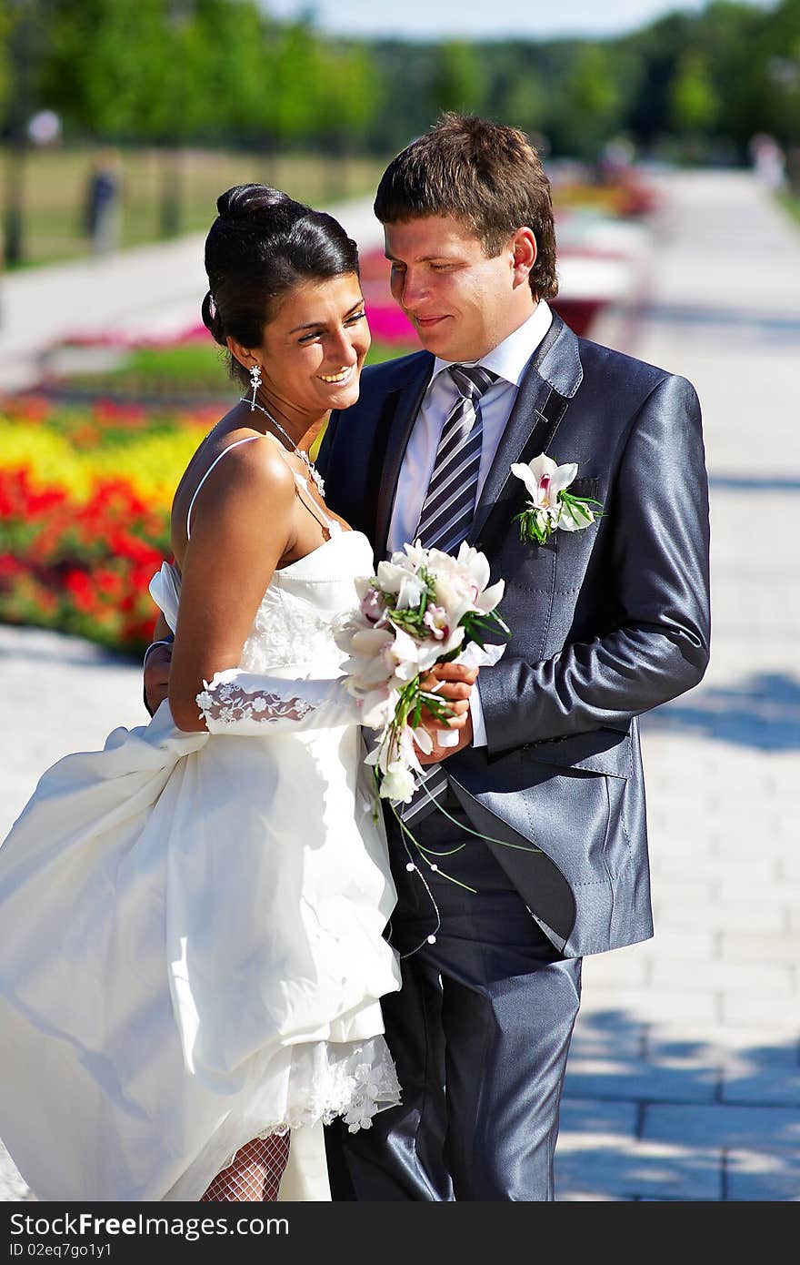 Bride and groom in park