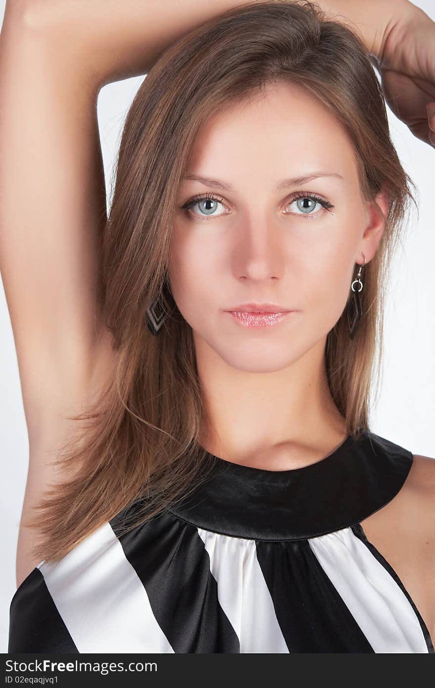 A pretty young woman posing on white. A pretty young woman posing on white