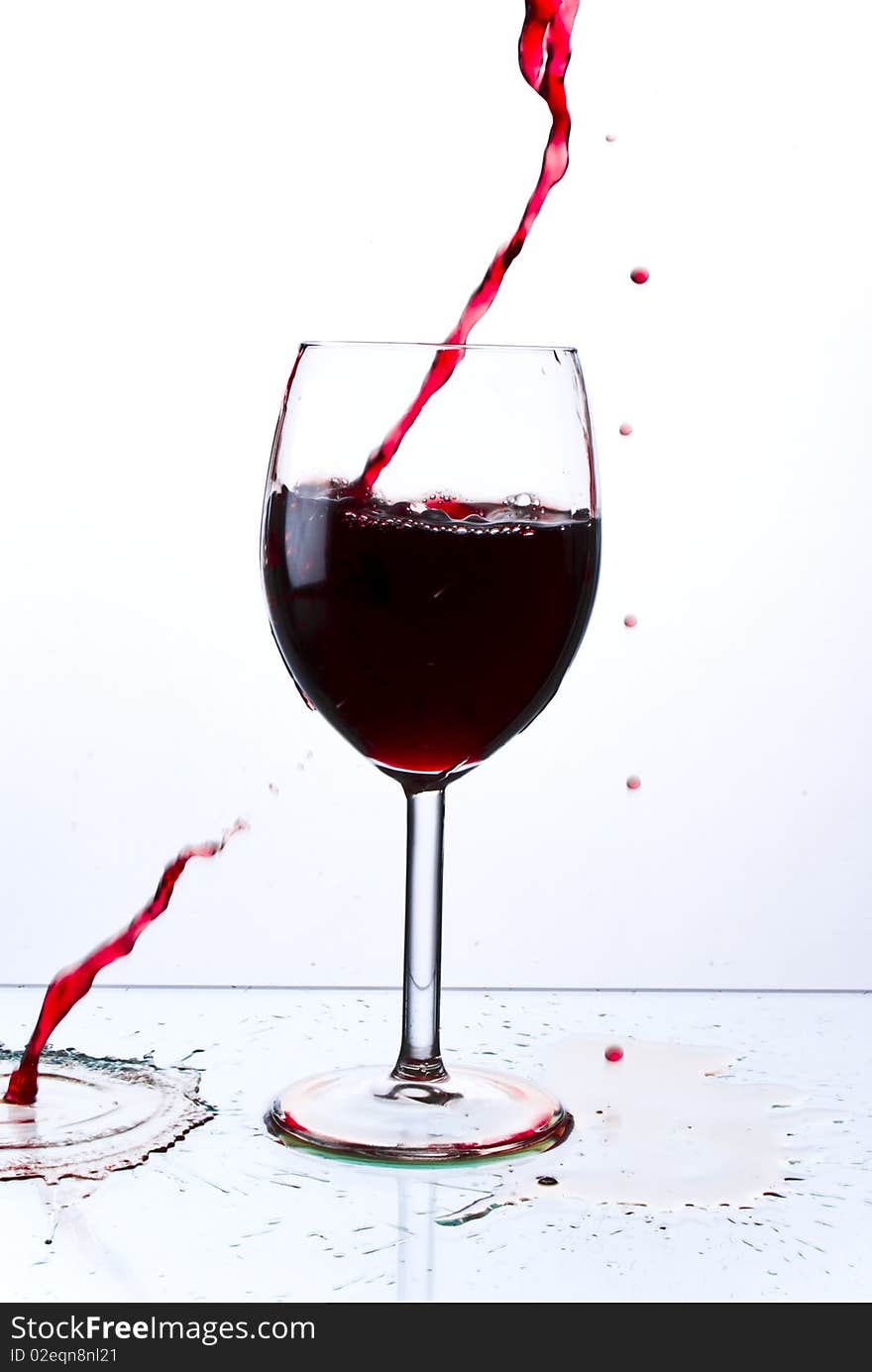 Red wine poured into glass