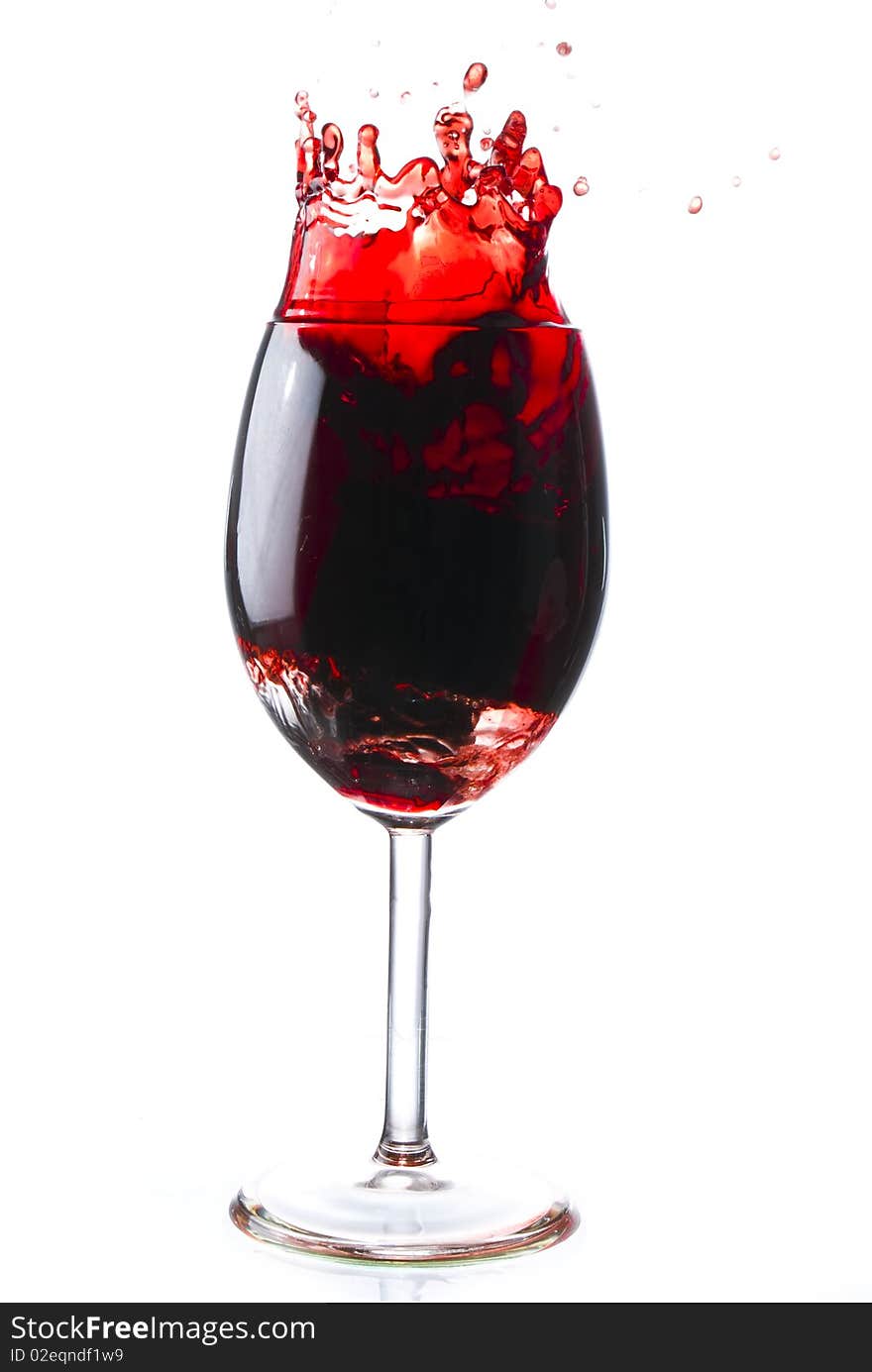 Red wine poured into glass. Red wine poured into glass