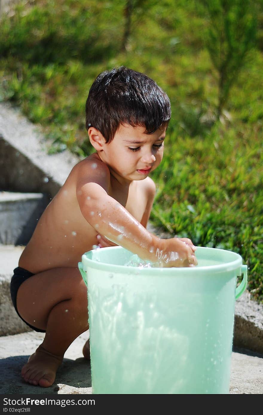 Very Cute Child Playing With Water