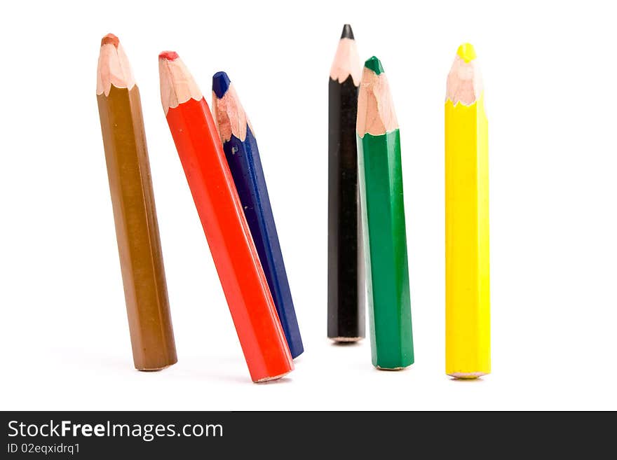 Thick pencils of different colors.