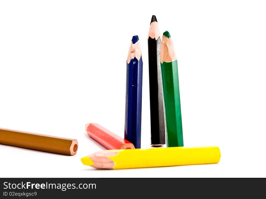 Thick pencils of different colors.