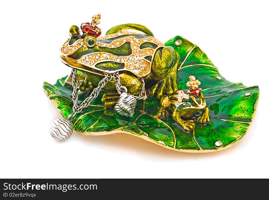 Frog- jewelry box with silver bracelet.