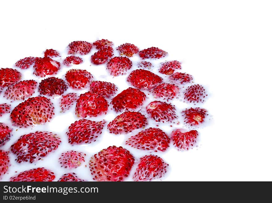 Strawberries and milk in a bowl. Strawberries and milk in a bowl