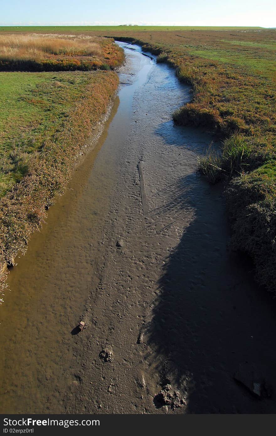 Tide-way near lighthouse, Westerhever Sand, Germany