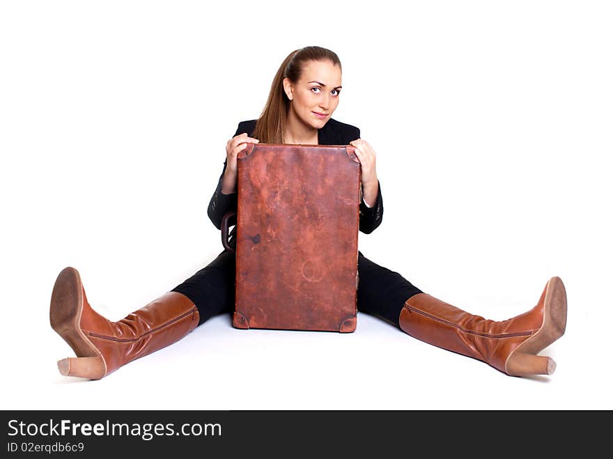 Sitting happy woman with suitcase