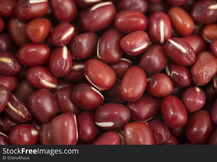 A pile of red adzuki beans, close up shot and selective focus.