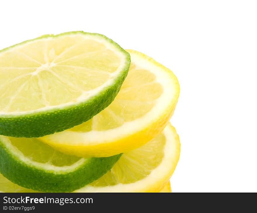 Closeup pisture of lemon and lime slices on white background