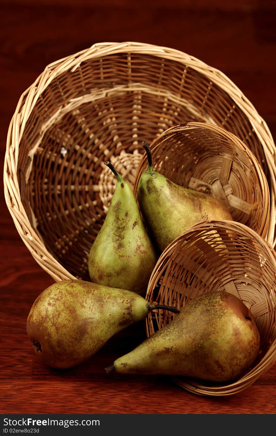 Still life of pears in baskets. Still life of pears in baskets