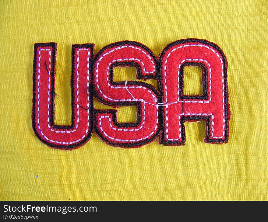 Marked in handmade cotton fabrics for clothing of various colors,banner United States of America. Marked in handmade cotton fabrics for clothing of various colors,banner United States of America