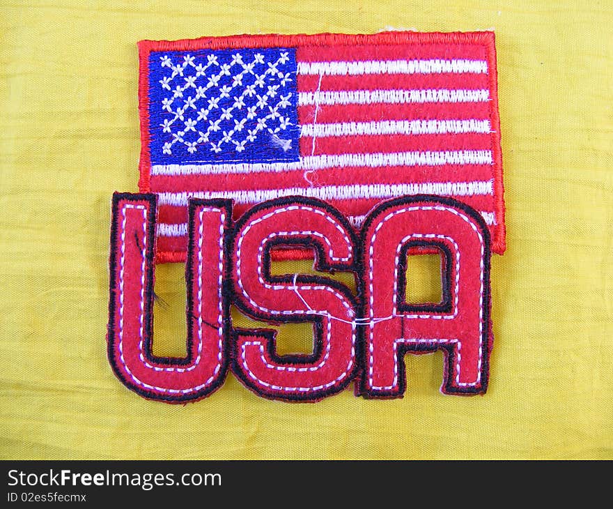 Marked in handmade cotton fabrics for clothing of various colors,banner United States of America. Marked in handmade cotton fabrics for clothing of various colors,banner United States of America