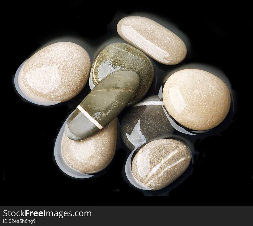 Stones isolated on black. Reflected. Stones isolated on black. Reflected.