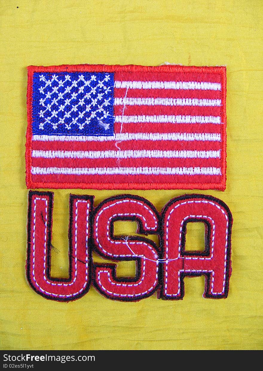 Marked in handmade cotton fabrics for clothing of various colors,banner United States of America. Marked in handmade cotton fabrics for clothing of various colors,banner United States of America