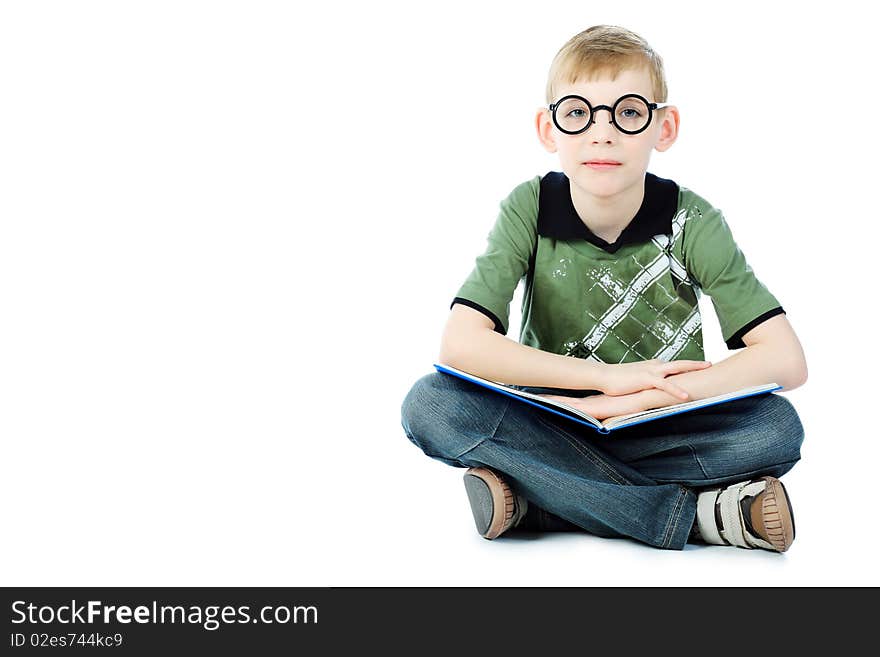 Portrait of a boy in a funny glasses. Isolated over white background. Portrait of a boy in a funny glasses. Isolated over white background.