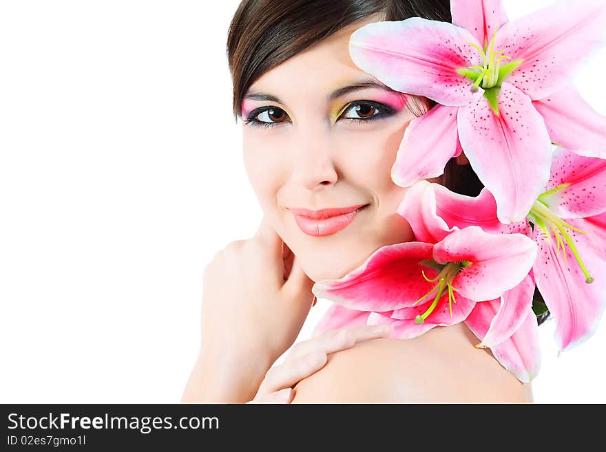 Shot of a young beautiful woman with a lily flowers. Isolated over white background. Shot of a young beautiful woman with a lily flowers. Isolated over white background.