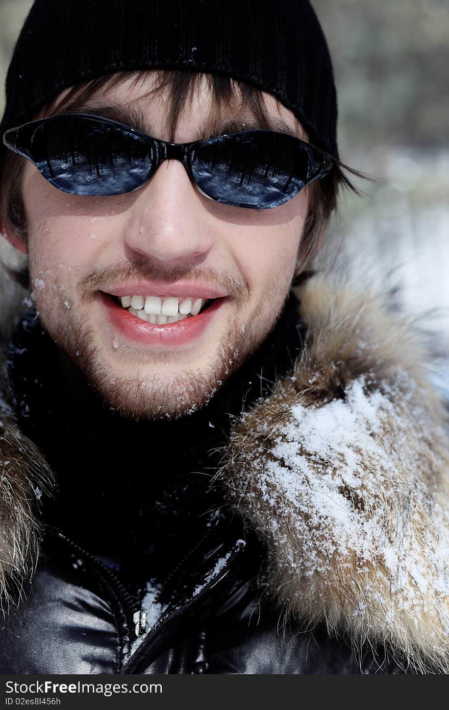 Portrait of a handsome man outdoor in winter.