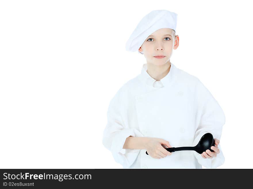 Shot of a little kitchen boy in a white uniform. Isolated over white background.