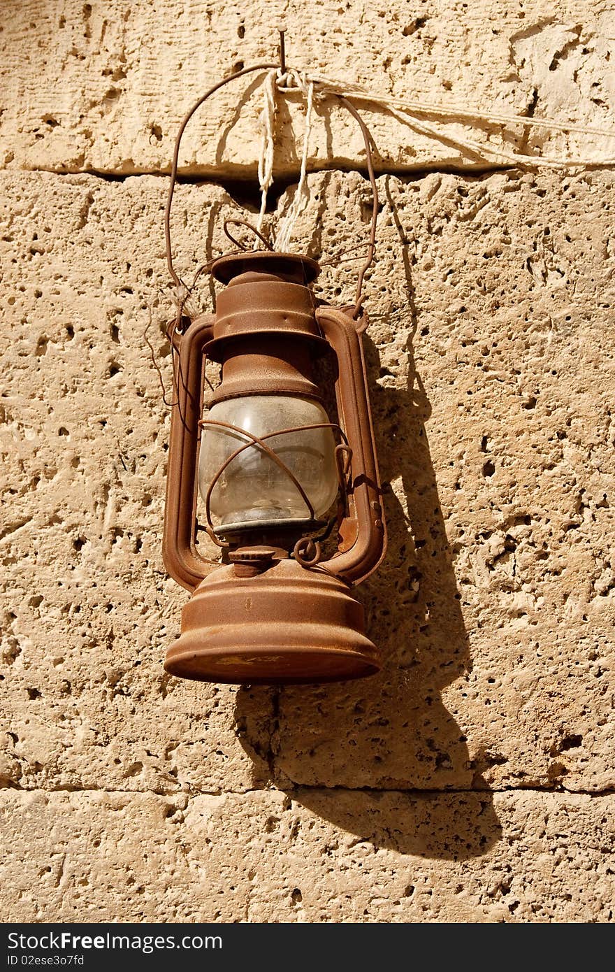 A lamp in an old Turkish stone oasis.