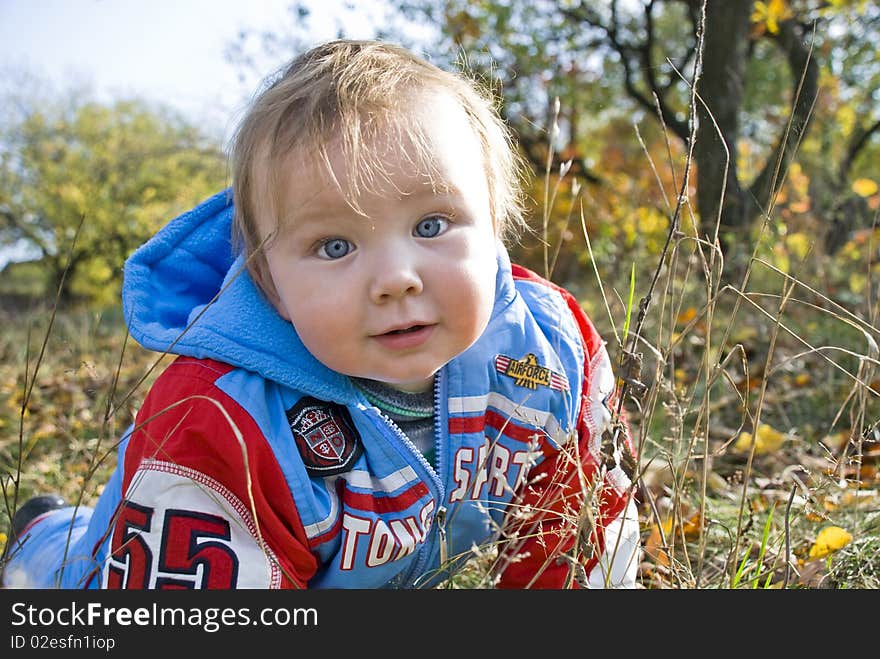 Portrait of the child in the city park. Portrait of the child in the city park