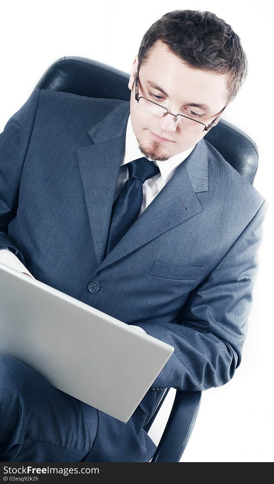 Business man with laptop in glasses