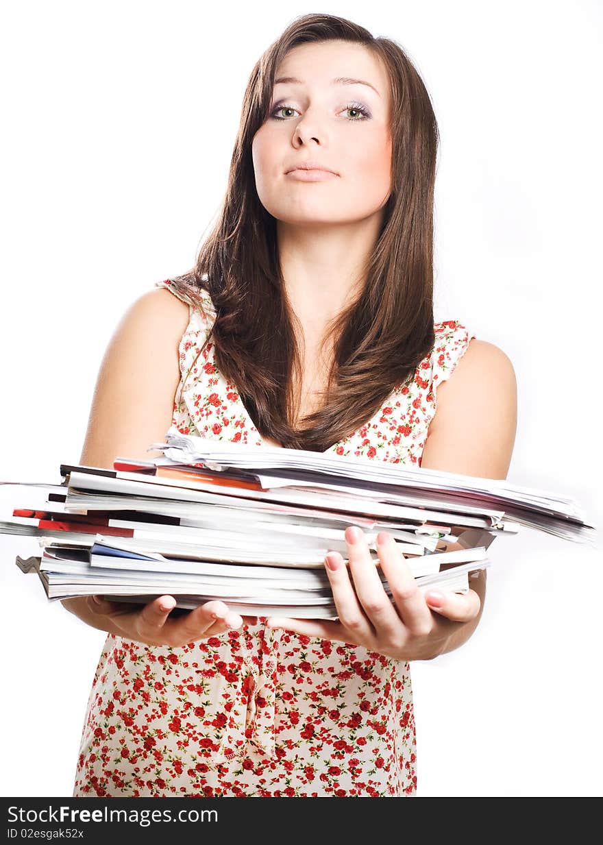 Beauty young woman with magazines (isolated)